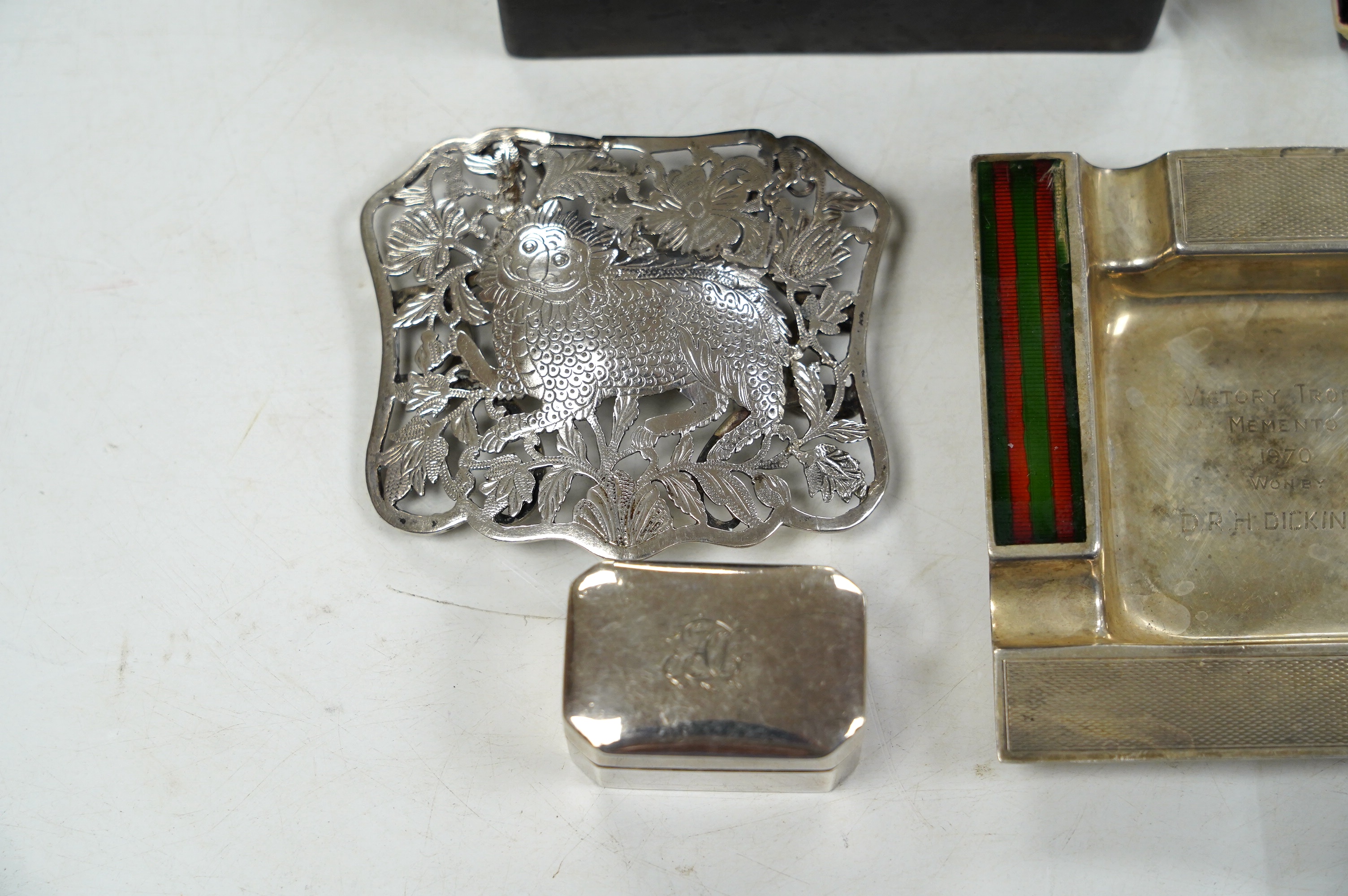 A George III silver nutmeg grater, Thomas Wilmore, Birmingham, 1801, 41mm, together with sundry other items including a silver ashtray and a sterling compact, Condition - poor to fair